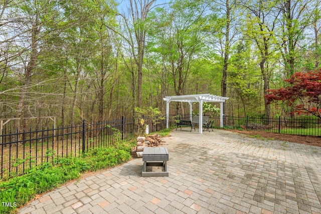 5900 Orchid Valley Rd, Raleigh, NC 27613 - view of patio featuring a pergola and outdoor dining space