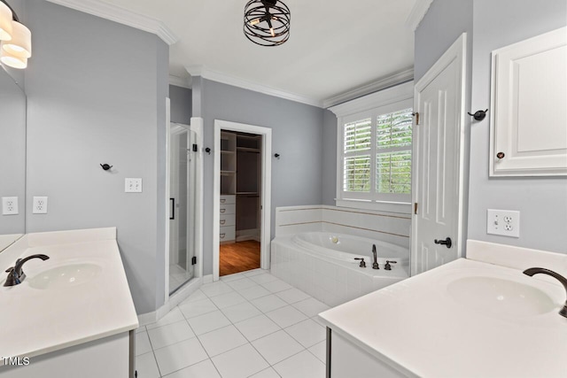 5900 Orchid Valley Rd, Raleigh, NC 27613 - full bath featuring two vanities, ornamental molding, a bath, and tile patterned flooring