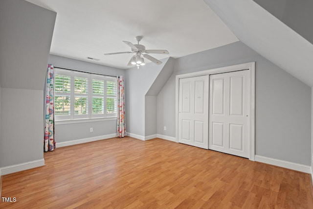 5900 Orchid Valley Rd, Raleigh, NC 27613 - additional living space featuring lofted ceiling, light wood-type flooring, ceiling fan, and baseboards