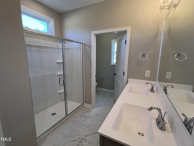 380 Pecan Valley Way, Four Oaks, NC 27524 - full bathroom with marble look tile flooring, toilet, a shower stall, double vanity, and baseboards