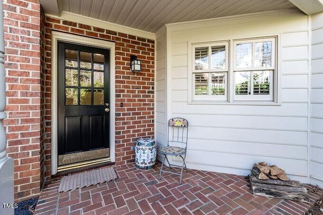 3005 Woodgreen Dr, Raleigh, NC 27607 - property entrance featuring brick siding and covered porch