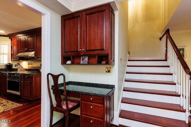 3005 Woodgreen Dr, Raleigh, NC 27607 - stairs with crown molding and wood finished floors