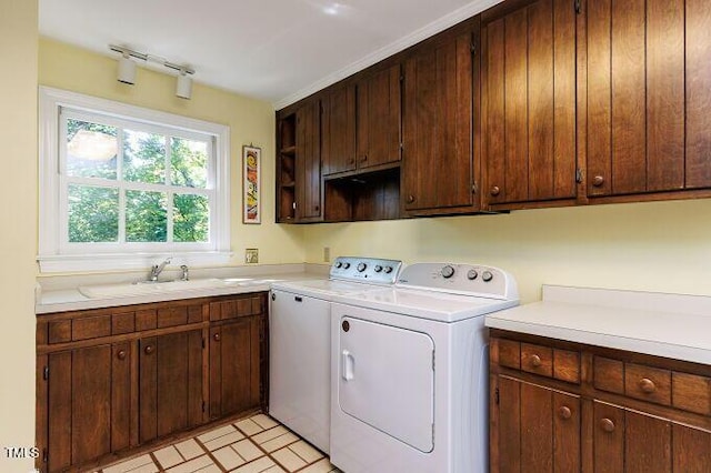 3005 Woodgreen Dr, Raleigh, NC 27607 - laundry area featuring cabinet space and washer and clothes dryer