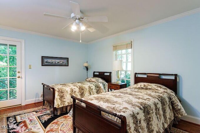 3005 Woodgreen Dr, Raleigh, NC 27607 - bedroom with ornamental molding, wood finished floors, multiple windows, and a ceiling fan