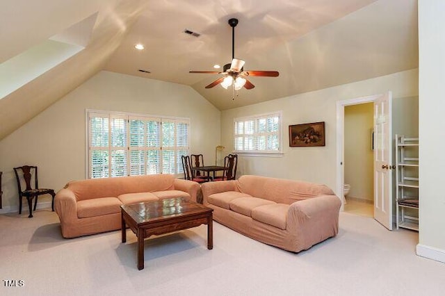 3005 Woodgreen Dr, Raleigh, NC 27607 - living room featuring lofted ceiling, ceiling fan, and light colored carpet