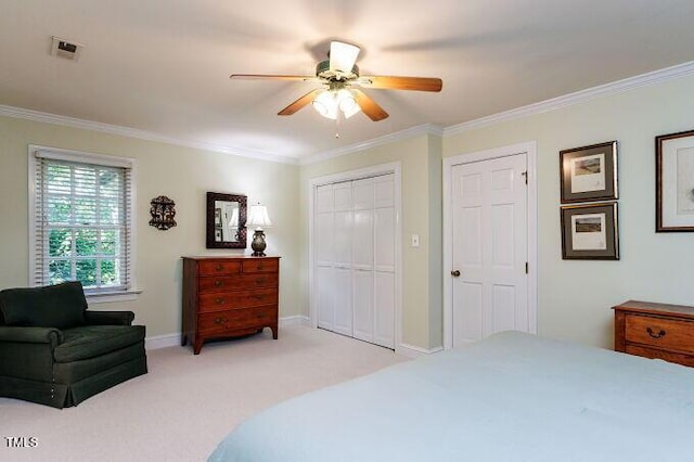 3005 Woodgreen Dr, Raleigh, NC 27607 - bedroom with crown molding, light colored carpet, a ceiling fan, and a closet