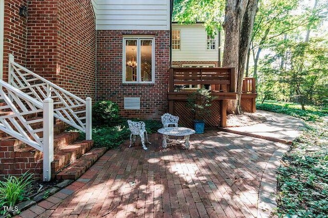 3005 Woodgreen Dr, Raleigh, NC 27607 - view of patio / terrace with stairs and a wooden deck