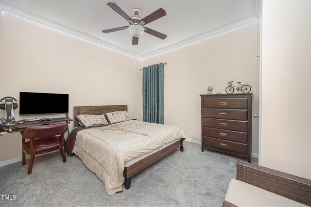 1030 Thoughtful Spot Ln, Durham, NC 27703 - bedroom featuring crown molding, light carpet, baseboards, and a ceiling fan