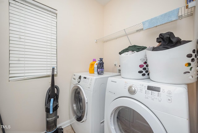 1030 Thoughtful Spot Ln, Durham, NC 27703 - clothes washing area featuring washer and clothes dryer and baseboards