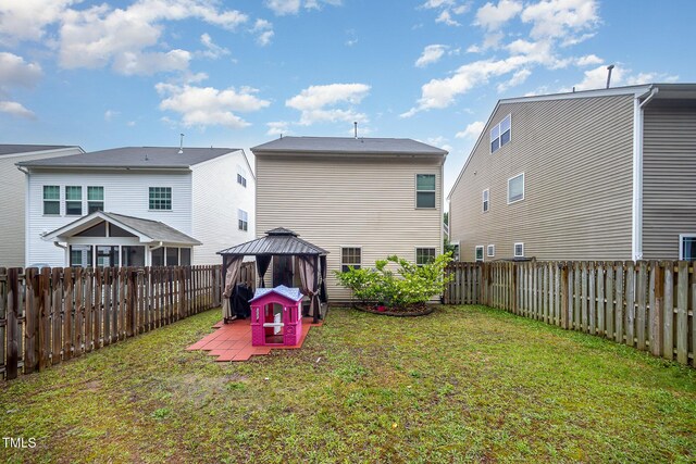 1030 Thoughtful Spot Ln, Durham, NC 27703 - rear view of property featuring a gazebo and a patio area