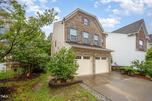 1030 Thoughtful Spot Ln, Durham, NC 27703 - view of front of house with an attached garage, driveway, and brick siding