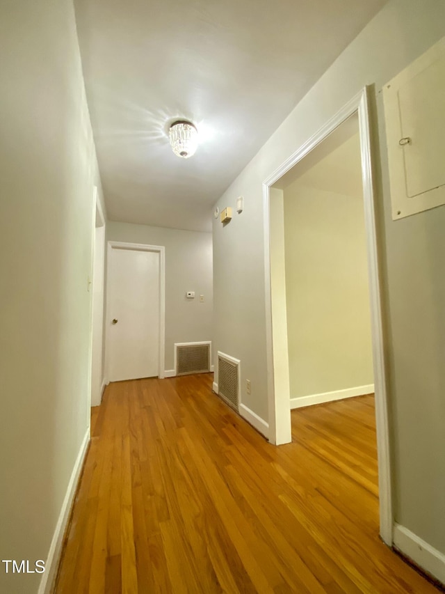 1115 Park Ave, Henderson, NC 27536 - hallway featuring wood finished floors and baseboards