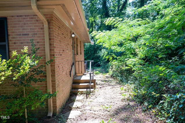 1115 Park Ave, Henderson, NC 27536 - view of side of home featuring brick siding