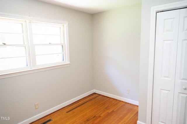 1115 Park Ave, Henderson, NC 27536 - spare room with light wood-style floors and baseboards