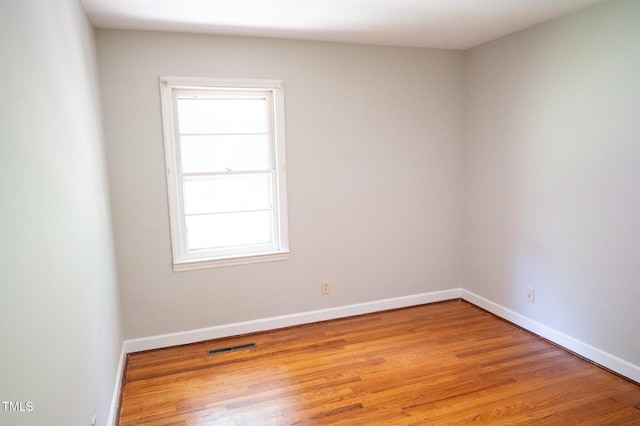 1115 Park Ave, Henderson, NC 27536 - empty room with light wood-style flooring and baseboards