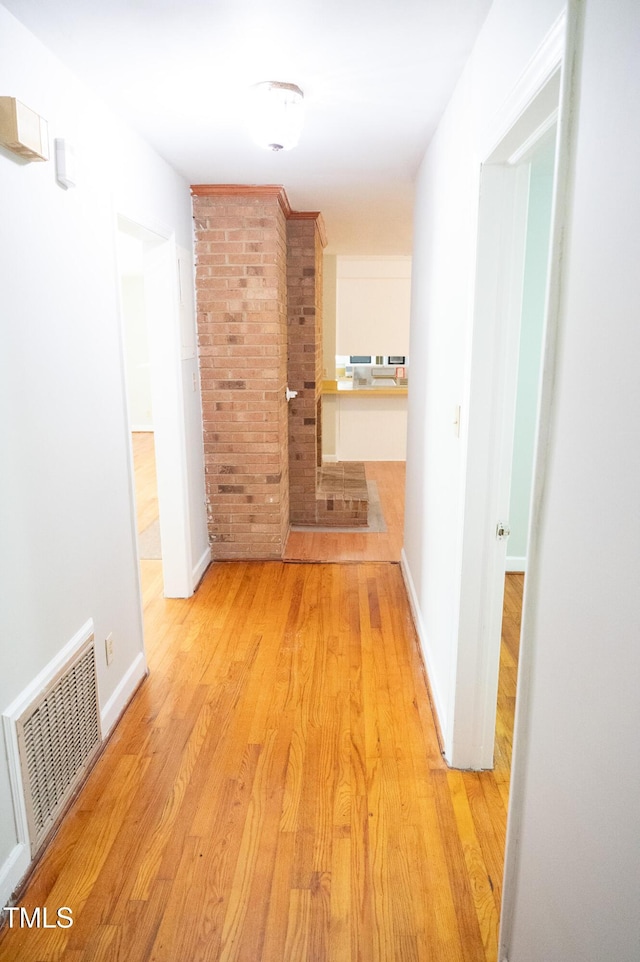 1115 Park Ave, Henderson, NC 27536 - hall with wood finished floors and baseboards