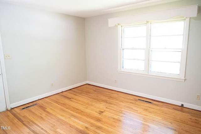 1115 Park Ave, Henderson, NC 27536 - unfurnished room featuring wood finished floors and baseboards
