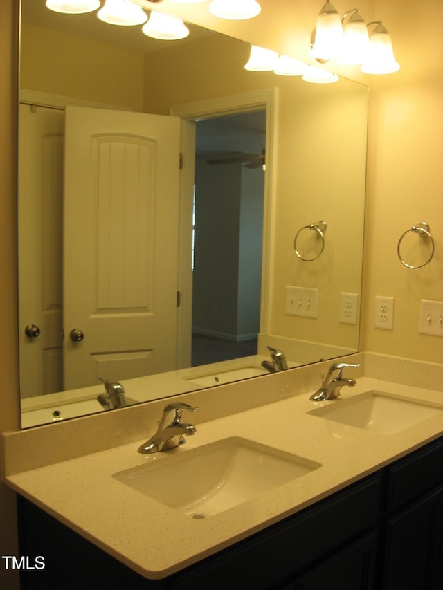 full bath featuring double vanity
