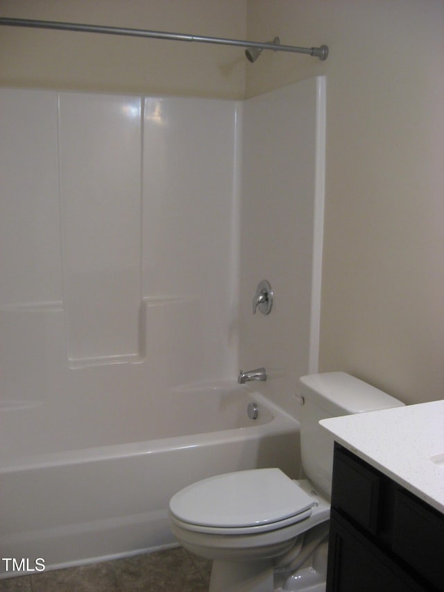 full bath featuring toilet, vanity, and shower / washtub combination