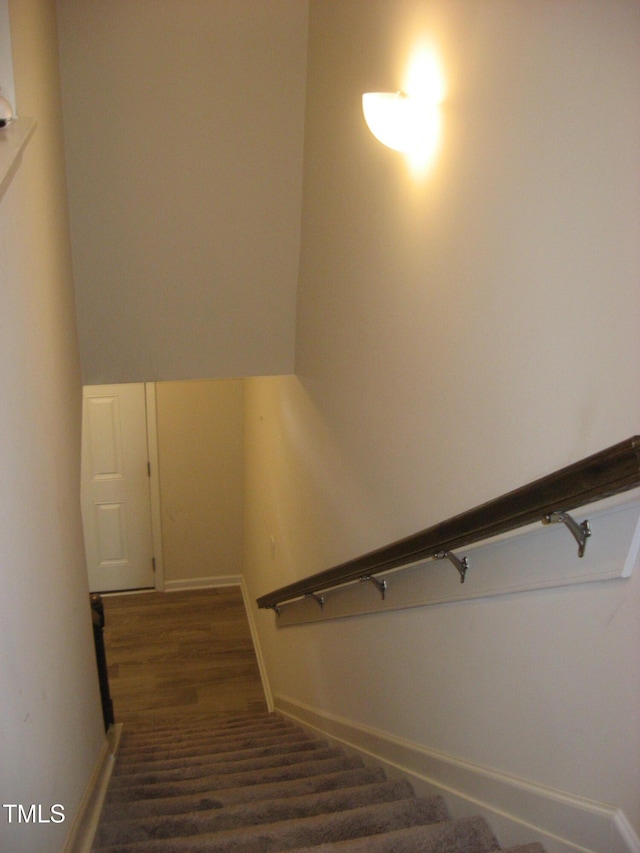 staircase with baseboards