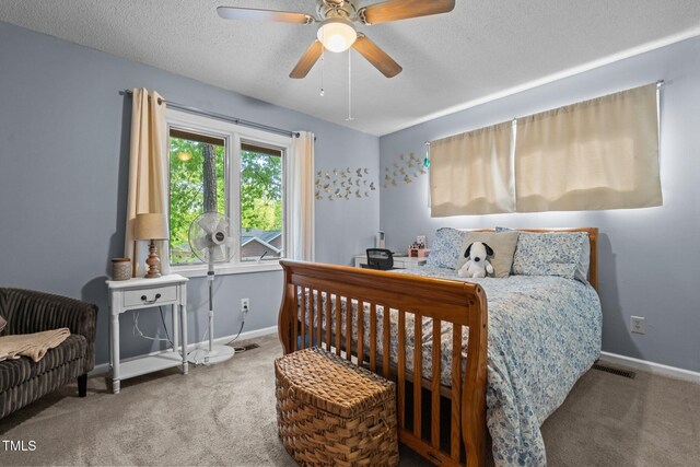 1801 Irish Blvd, Sanford, NC 27332 - carpeted bedroom featuring baseboards, a textured ceiling, and visible vents