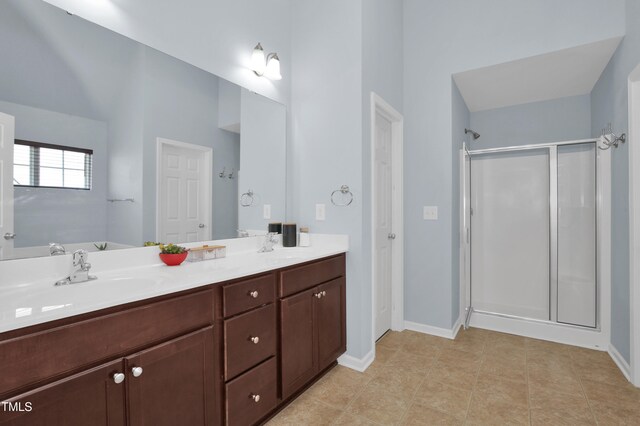 5824 Lady Way, Hope Mills, NC 28348 - bathroom with double vanity, a sink, baseboards, and a shower stall