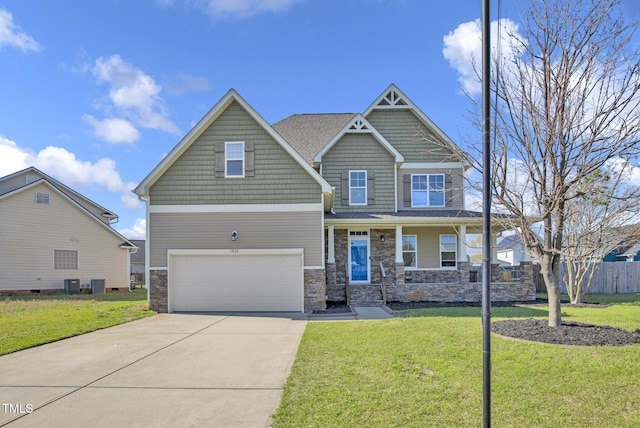 5824 Lady Way, Hope Mills, NC 28348 - craftsman inspired home with concrete driveway, fence, stone siding, central AC unit, and a front yard