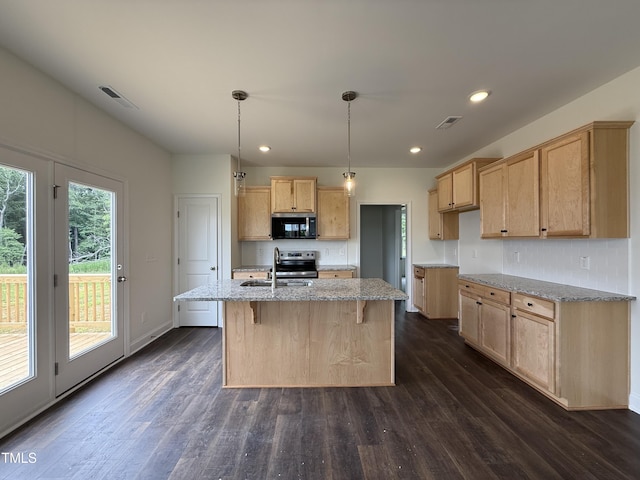 274 Longbow Dr, Middlesex, NC 27557 - kitchen with light brown cabinets, dark wood-style flooring, light stone counters, a kitchen island with sink, and recessed lighting