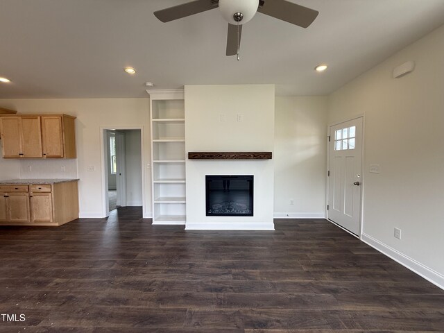 274 Longbow Dr, Middlesex, NC 27557 - unfurnished living room with a ceiling fan, a glass covered fireplace, dark wood-type flooring, and recessed lighting