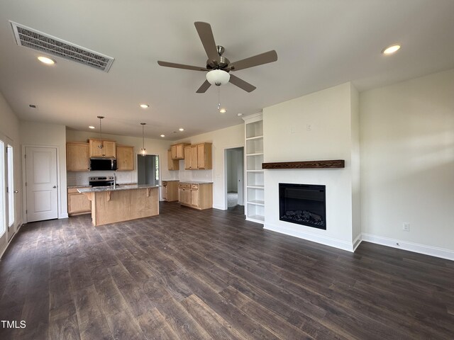274 Longbow Dr, Middlesex, NC 27557 - unfurnished living room featuring recessed lighting, dark wood-style floors, ceiling fan, and a fireplace
