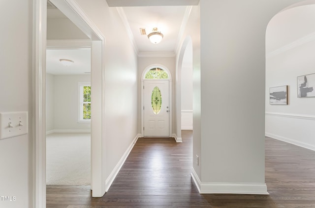 315 Copper Ridge Dr, Sanford, NC 27330 - entrance foyer with baseboards, arched walkways, dark wood-style flooring, and crown molding