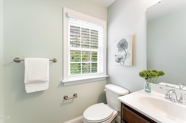 315 Copper Ridge Dr, Sanford, NC 27330 - half bath featuring baseboards, toilet, and vanity