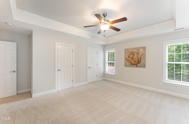 315 Copper Ridge Dr, Sanford, NC 27330 - unfurnished room with carpet, a raised ceiling, ceiling fan, and crown molding