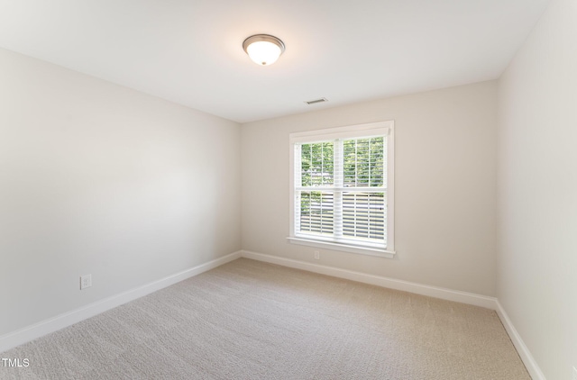 315 Copper Ridge Dr, Sanford, NC 27330 - carpeted spare room featuring visible vents and baseboards