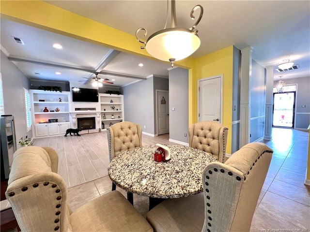 dining room featuring light tile patterned floors, visible vents, crown molding, and ceiling fan