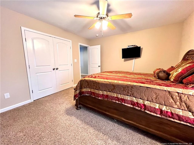 bedroom featuring carpet, baseboards, and a ceiling fan