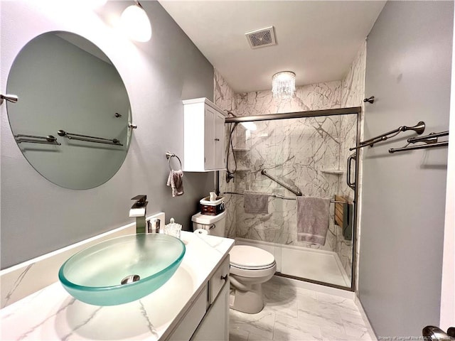full bathroom with vanity, visible vents, toilet, marble finish floor, and a marble finish shower