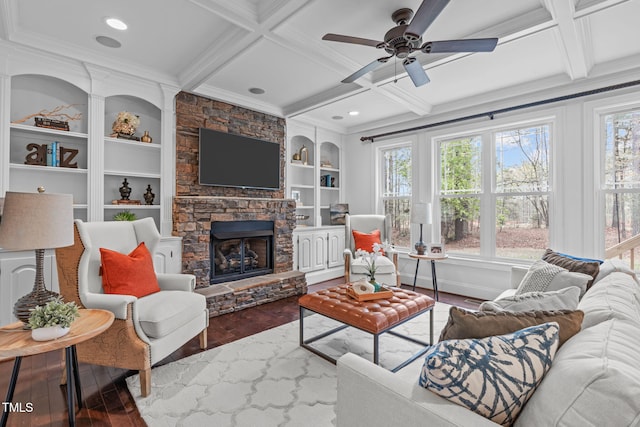 living area featuring plenty of natural light and wood finished floors