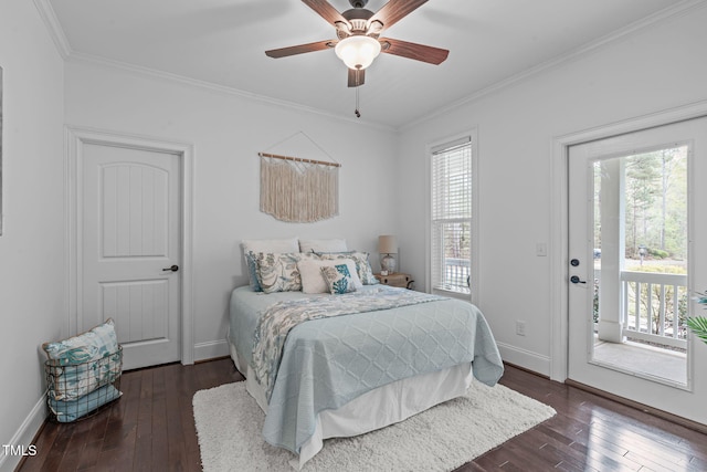 bedroom with dark wood-style floors, access to outside, crown molding, and multiple windows