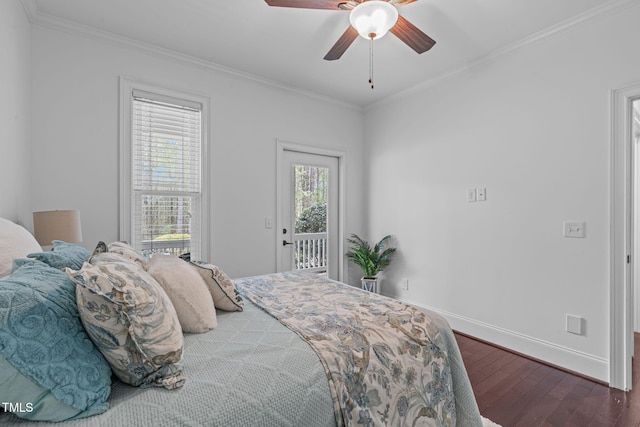 bedroom with baseboards, access to exterior, crown molding, and dark wood finished floors