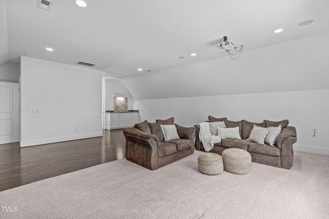 living room with recessed lighting, visible vents, baseboards, and lofted ceiling