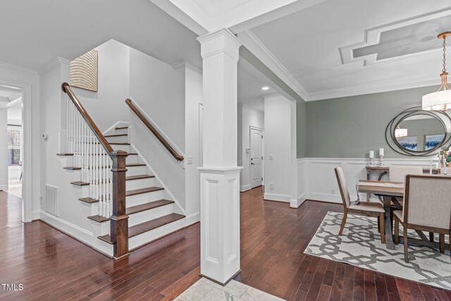 2408 Merion Creek Dr, Apex, NC 27539 - dining room with wood-type flooring, wainscoting, crown molding, stairs, and decorative columns