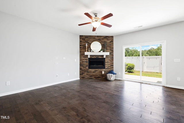122 Torpoint Rd, Durham, NC 27703 - living room with a ceiling fan, a fireplace, and dark wood-type flooring