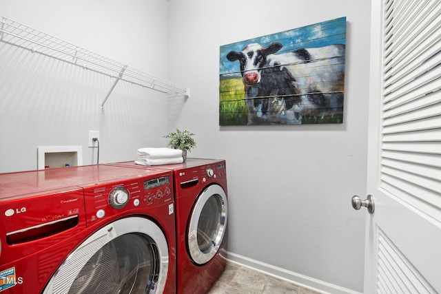 122 Torpoint Rd, Durham, NC 27703 - laundry room featuring washing machine and dryer and baseboards