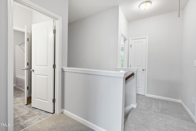 122 Torpoint Rd, Durham, NC 27703 - hall with an upstairs landing and light colored carpet