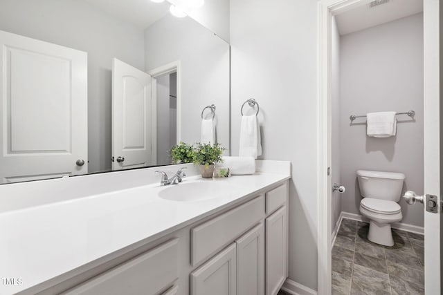 122 Torpoint Rd, Durham, NC 27703 - bathroom with vanity and toilet