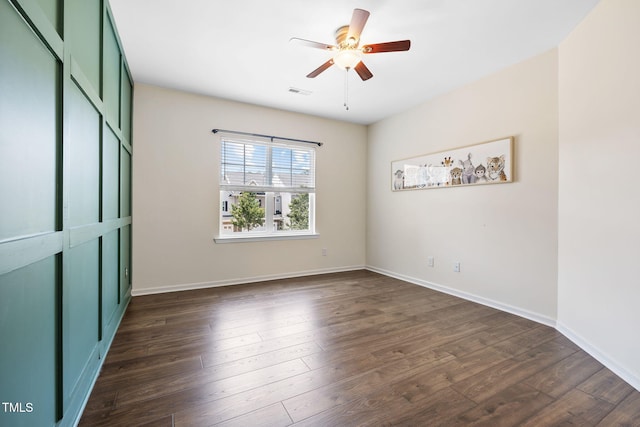 122 Torpoint Rd, Durham, NC 27703 - unfurnished bedroom featuring dark wood-style flooring and ceiling fan