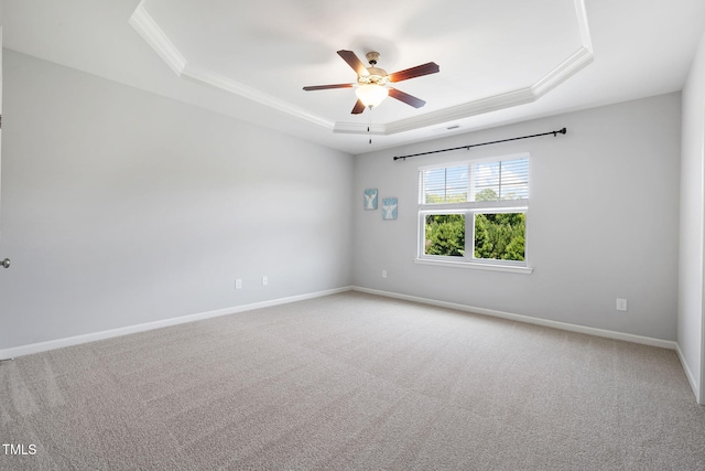 122 Torpoint Rd, Durham, NC 27703 - empty room featuring a tray ceiling, crown molding, a ceiling fan, and carpet flooring