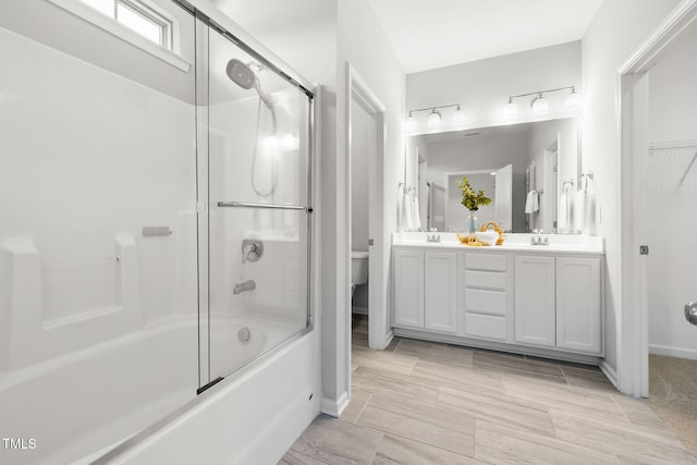 122 Torpoint Rd, Durham, NC 27703 - bathroom with double vanity and enclosed tub / shower combo
