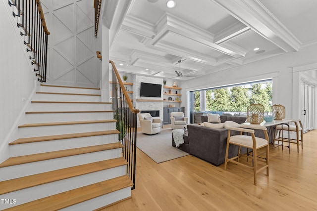 1208 Hunting Ridge Rd, Raleigh, NC 27615 - living room with ceiling fan, coffered ceiling, stairway, wood finished floors, and a fireplace